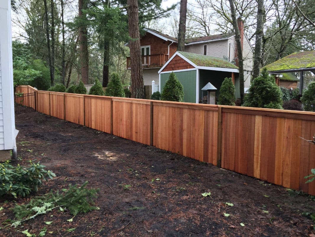 privacy fence with top rail